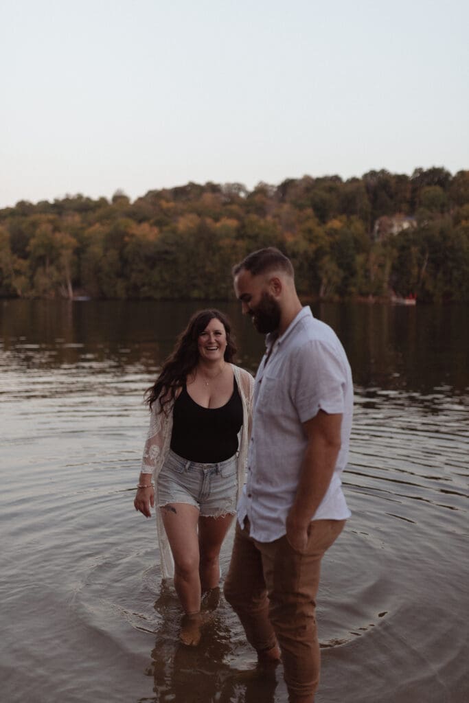 Engaged couple at a beach in the Ottawa Valley.