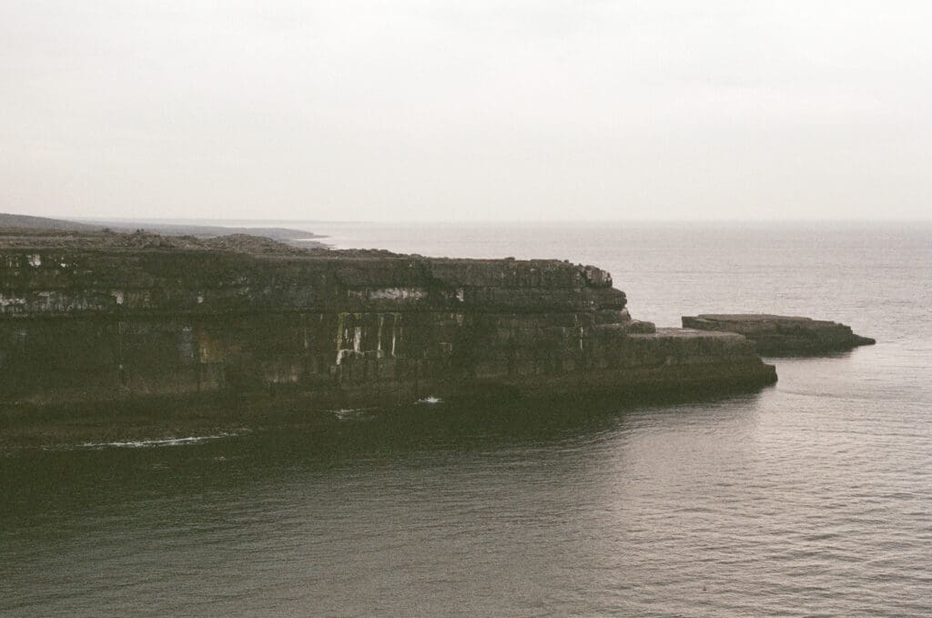 The Black Fort cliffs on Inis Mór (Inishmore), the Aran Islands. Shot in 35mm film.