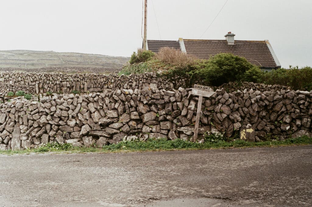 Black Fort signage on Inis Mór (Inishmore), the Aran Islands. Shot in 35mm film.