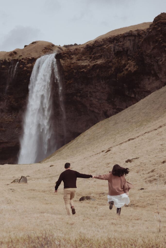 Seljalandsfoss waterfall in Iceland, engagement photos.