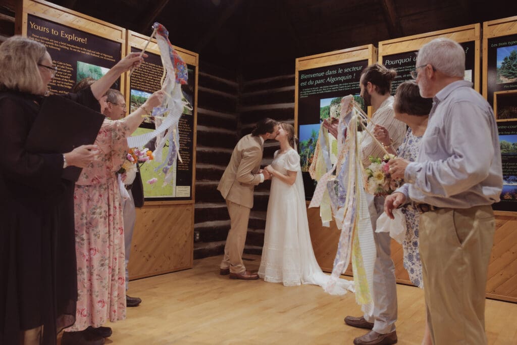 An eloping couple getting married in the old ranger cabin at Achray Campground, Algonquin Park.
