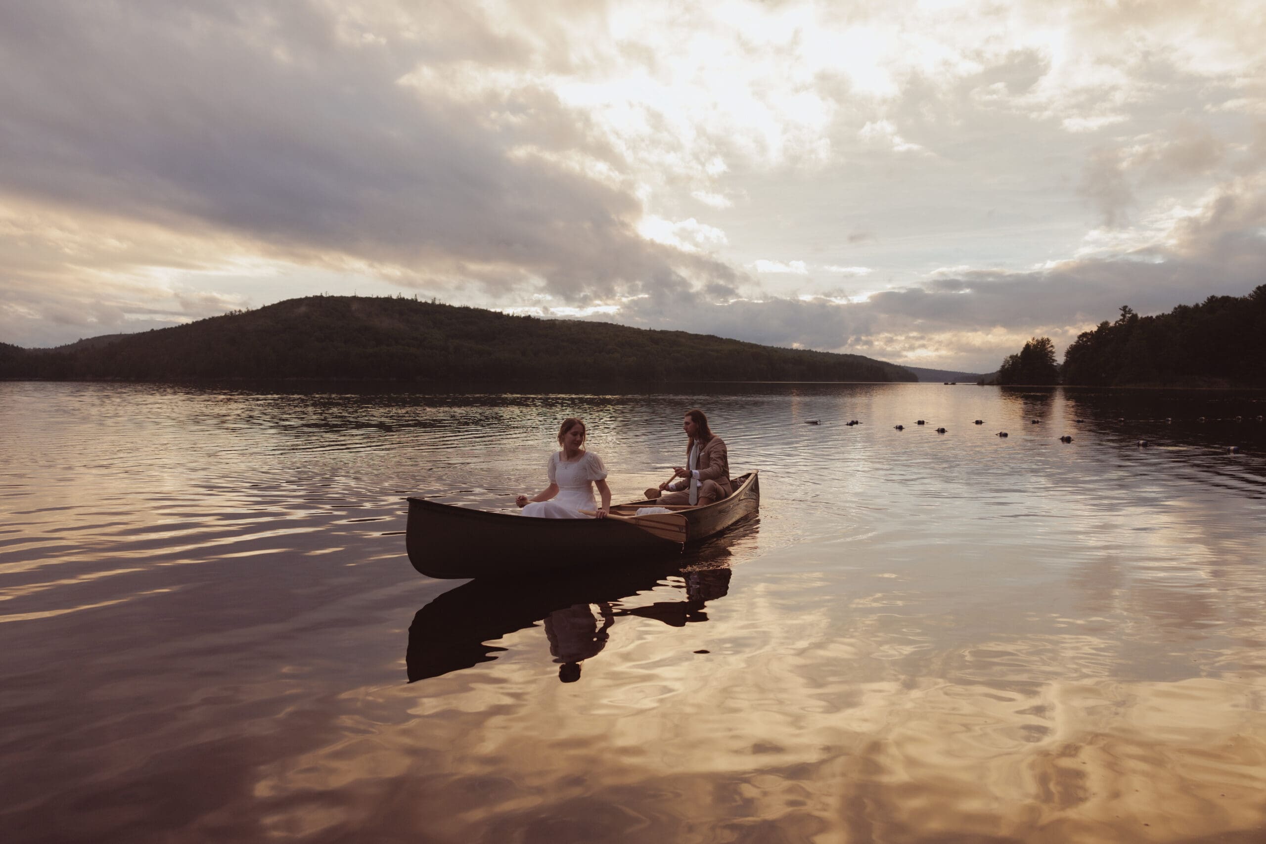Elopement portraits in a canoe at Algonquin Park.